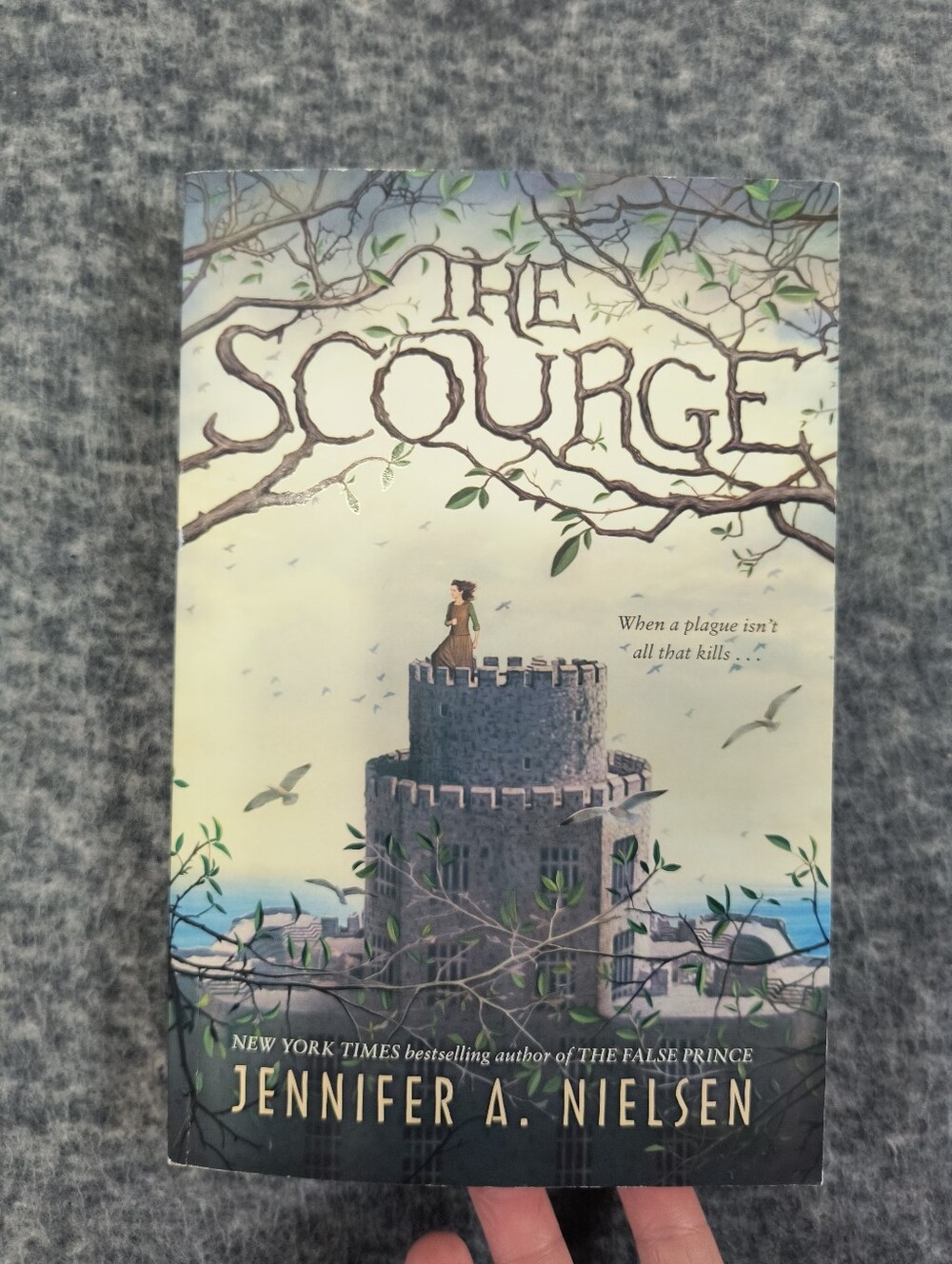 "The Scourge" book by Jennifer A. Nielsen